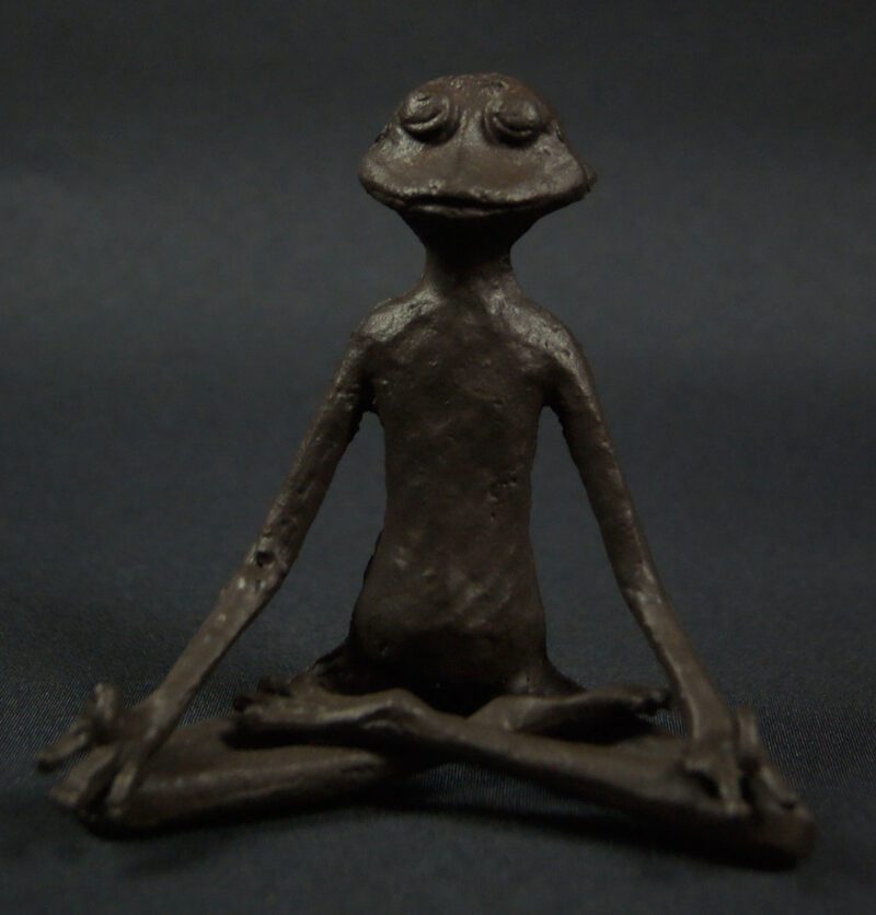Yoga frog hands on knee