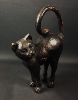 Cat standing black small