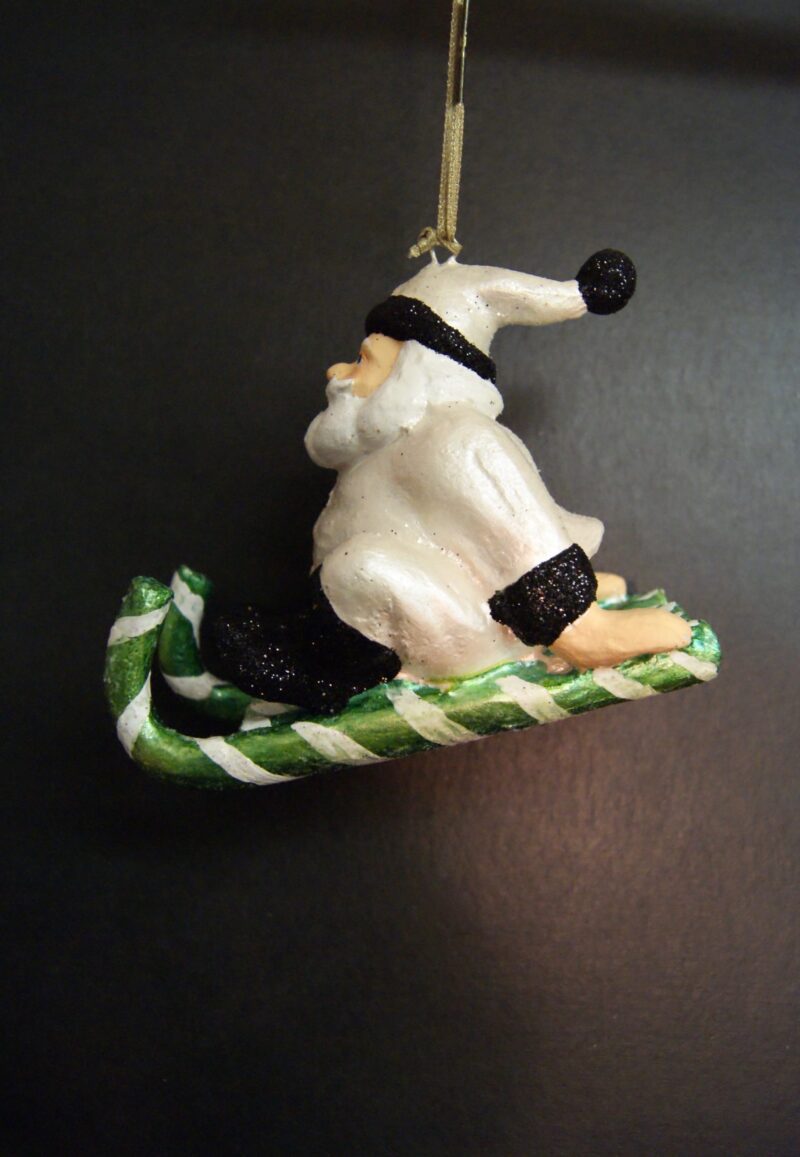 small santa on sled white