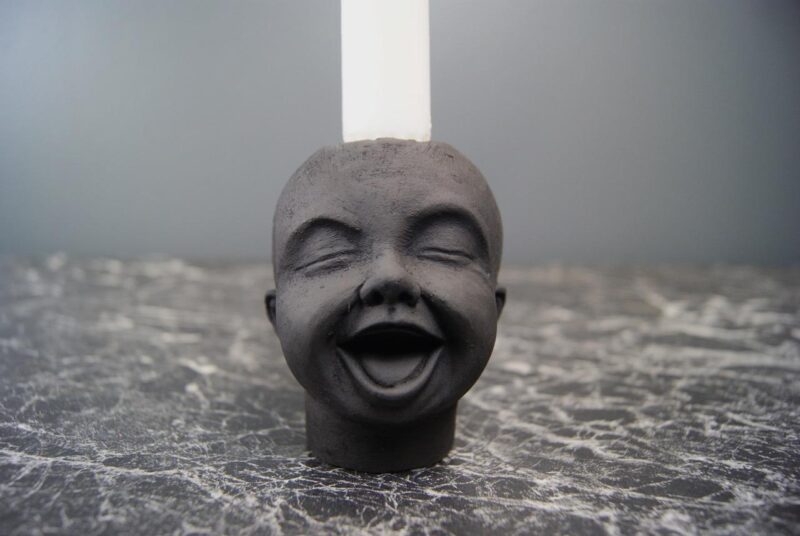SML BABY HEAD CH OPEN MOUTH BLK