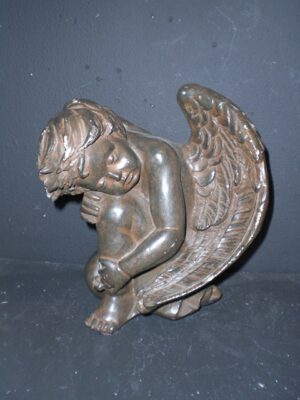 Sleeping Cherub Wood