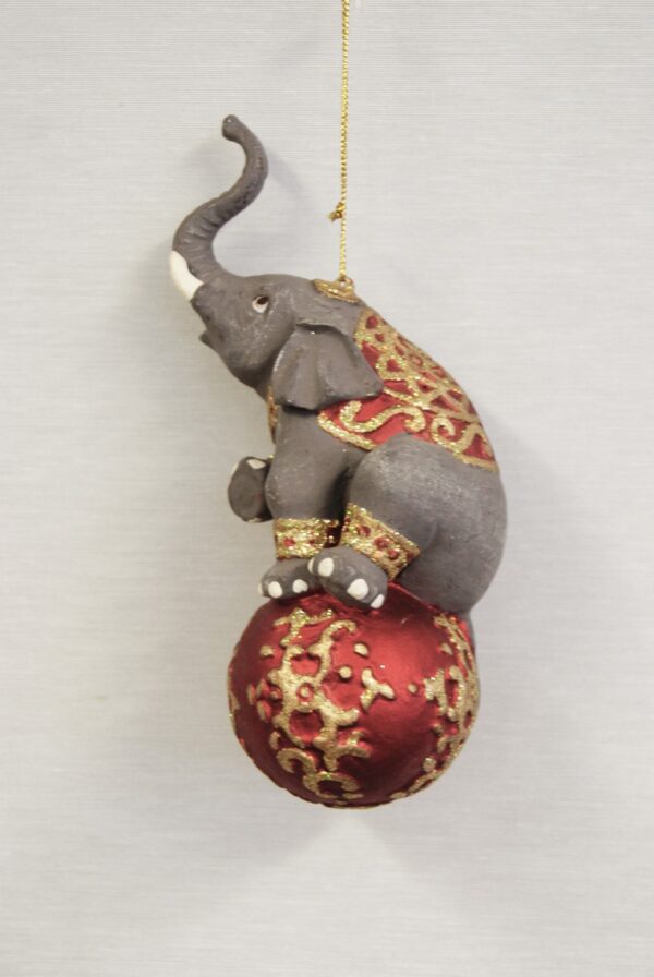 Elephant on ball orn red