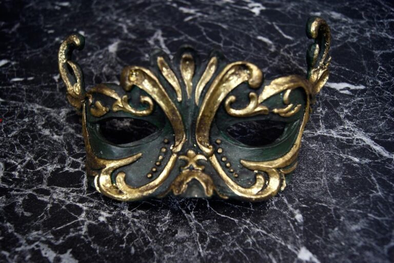 Masquerade mask green gold details ant