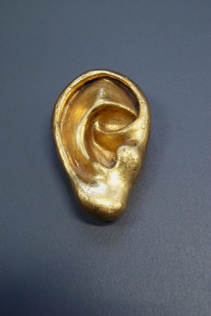 Gold Ear with Antique wall décor