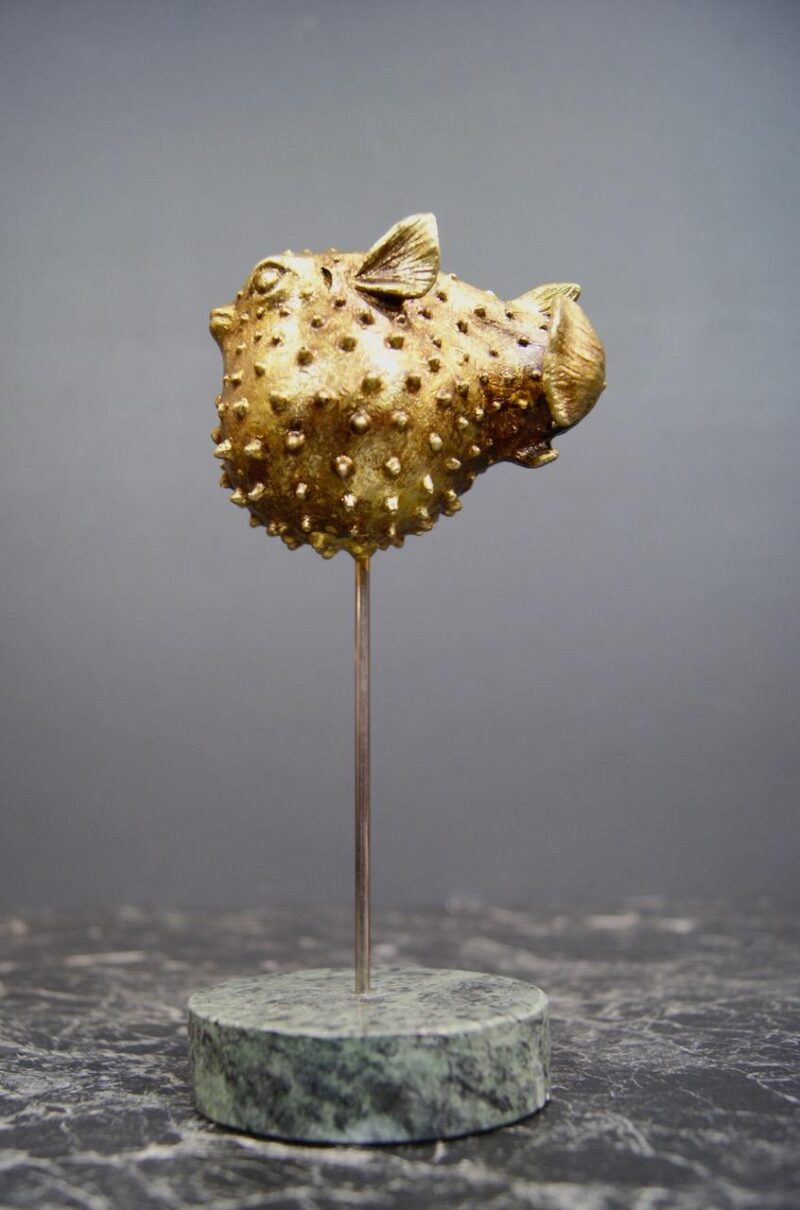 Globe fish on marble base