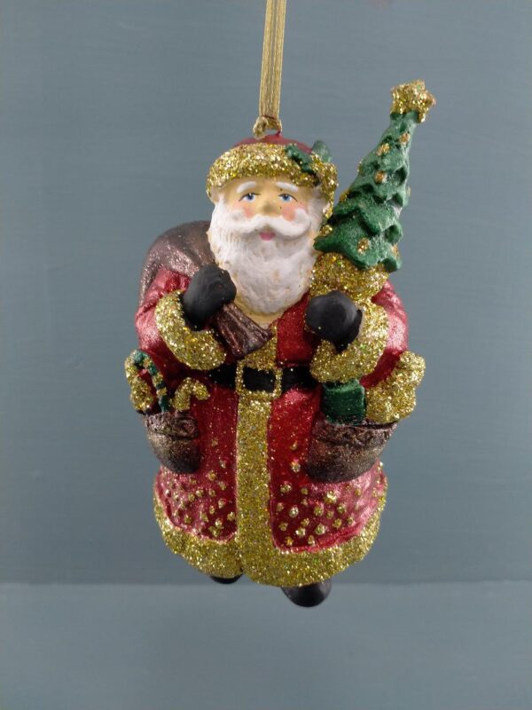 Standing Santa holding tree & bag gold glits details