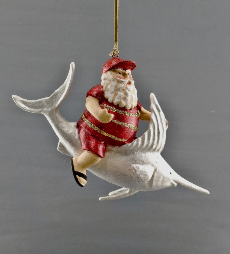Santa riding on pearlized swordfish