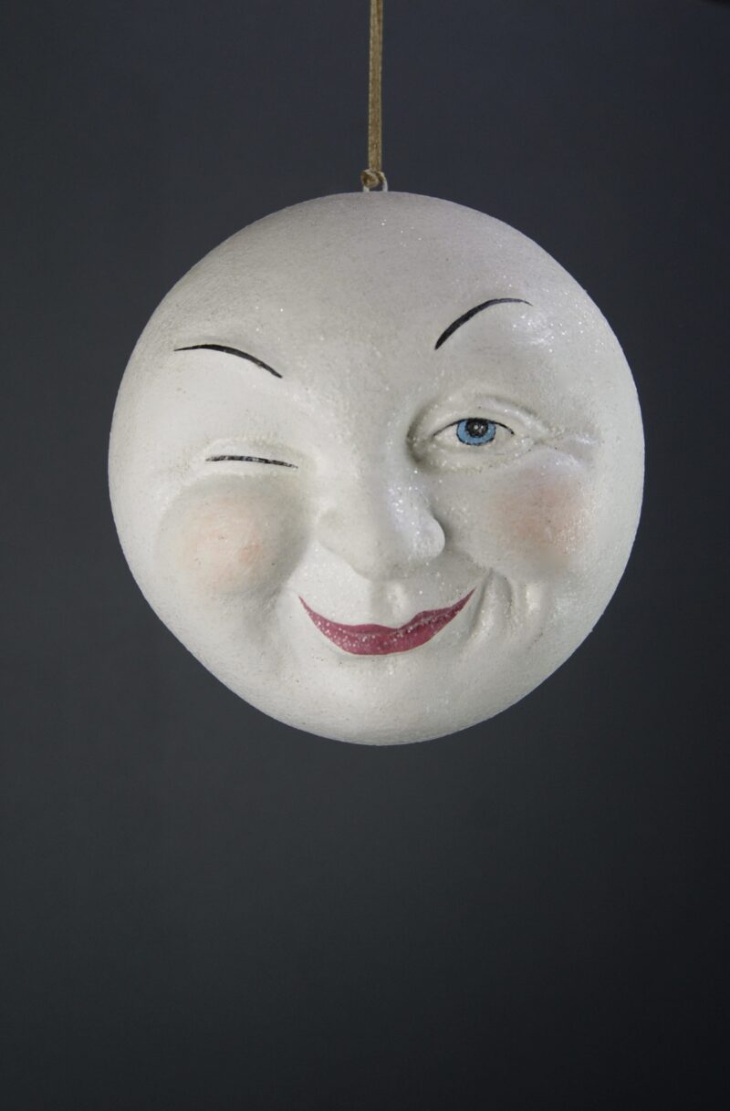 Moonhead winking eyes orn white w/ glitter