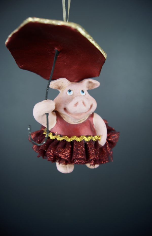 Percy pig holding umbrella sat red w/ fabskirt