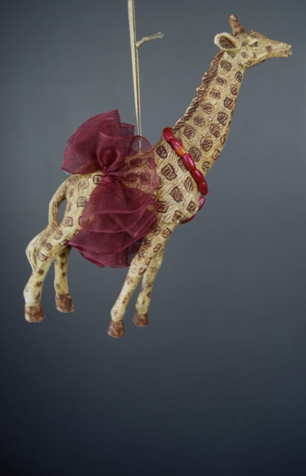 Giraffe orn w/ red skirt