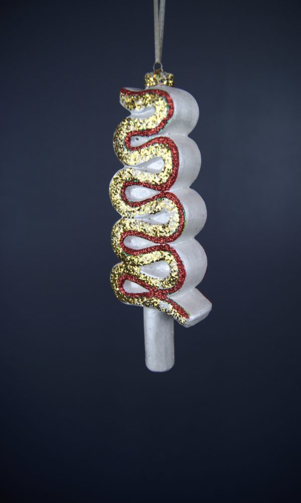 Bent lollipop white pearl w/ gold & red glitter