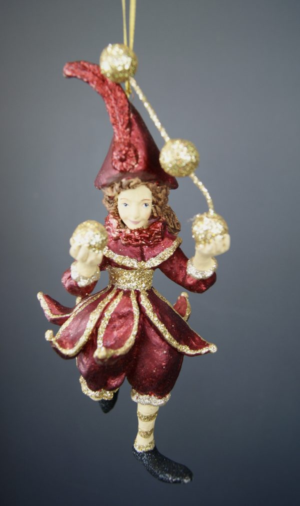 Arabian juggler holding balls sat red & gold details