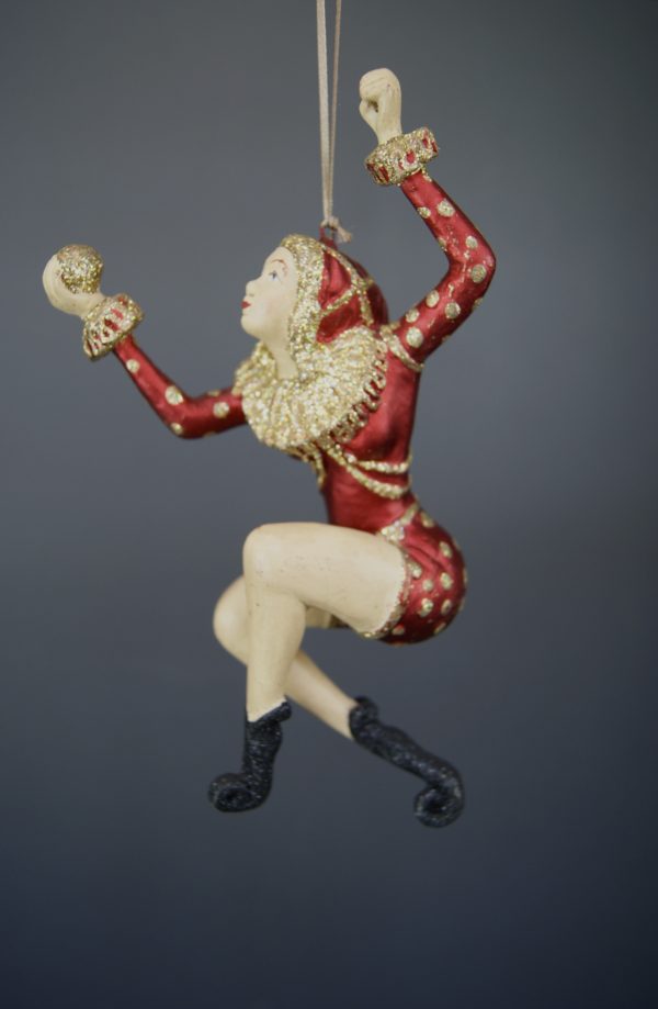 Lady jester holding ball S red glit