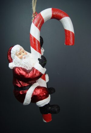 Santa holding candy cane