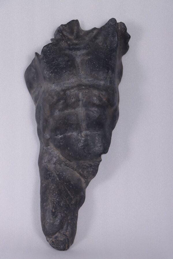 Male torso Aged black stone