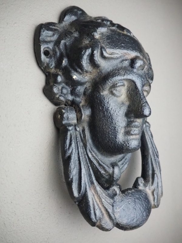 Weathered Athena iron knocker
