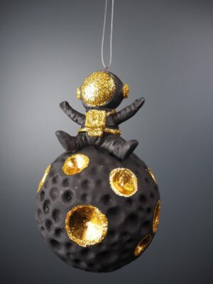 Astroboy on planet ball black/ gold glits