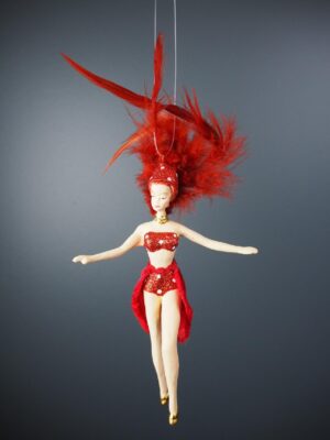 Showgirl in red dress with feathers