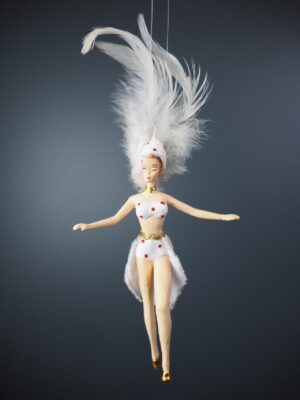Showgirl in white dress with feathers