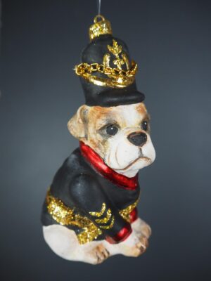 Realistic English dog in blk coat with chain on hat