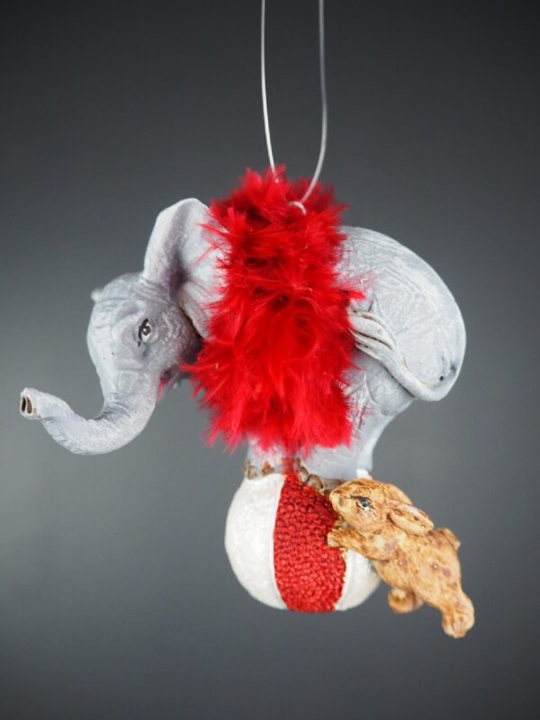 Elephant orn white & red w/ red feath