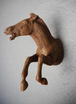 Rusty Horse on Wall