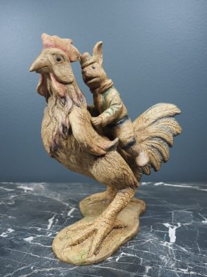 Rooster w rabbit on back