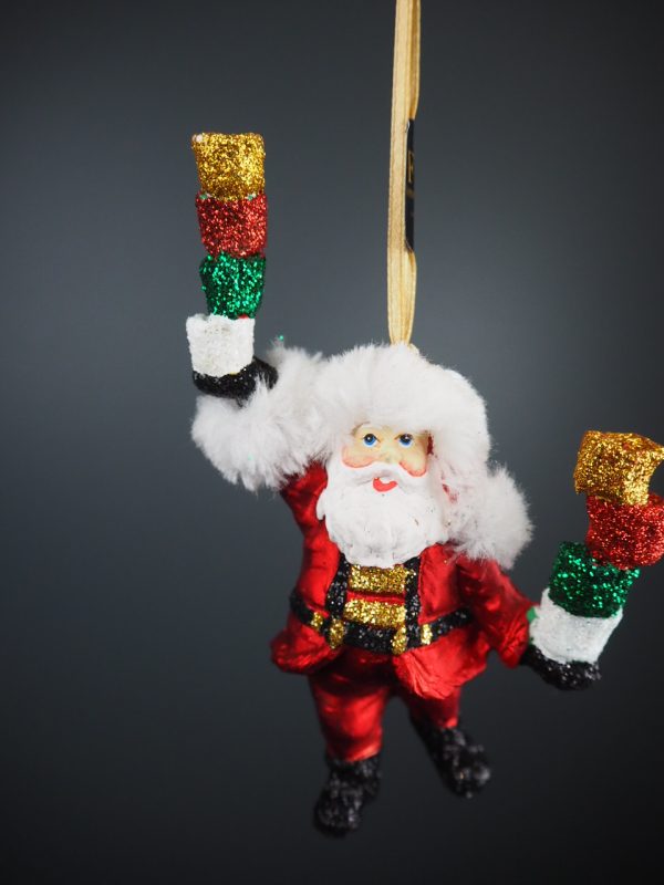 Santa holding colorful cholate tower in satin red with fur o - Image 2