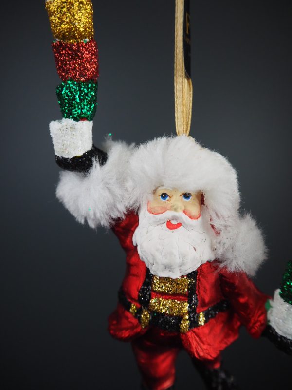 Santa holding colorful cholate tower in satin red with fur o - Image 4