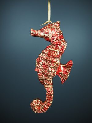 Seahorse in fading red/gold orn