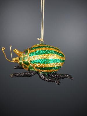 Lady bug in green & gold glits orn