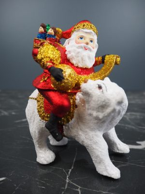 Santa in satin red riding on bear w/ glits