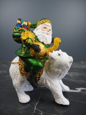 Santa in satin green riding on bear w/ glits