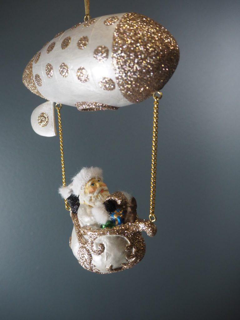 Santa in balloon rocket pearl white champ polka glits orn w/