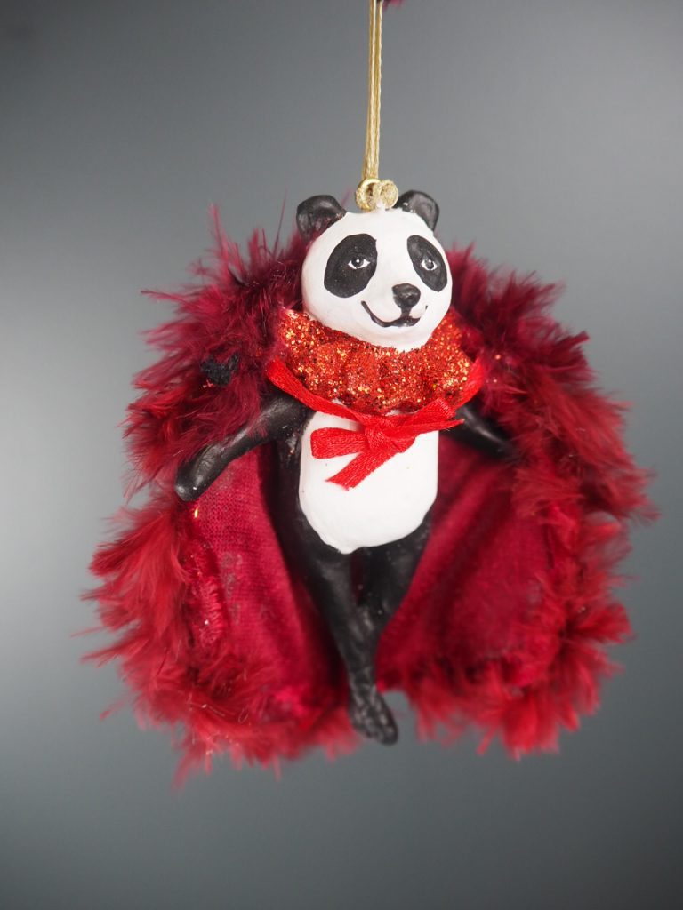 Panda showman with red cape orn