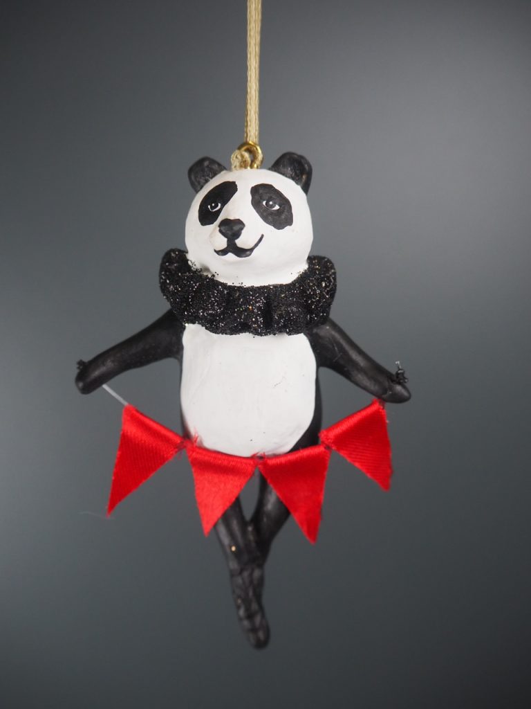 Panda showman w red flag orn