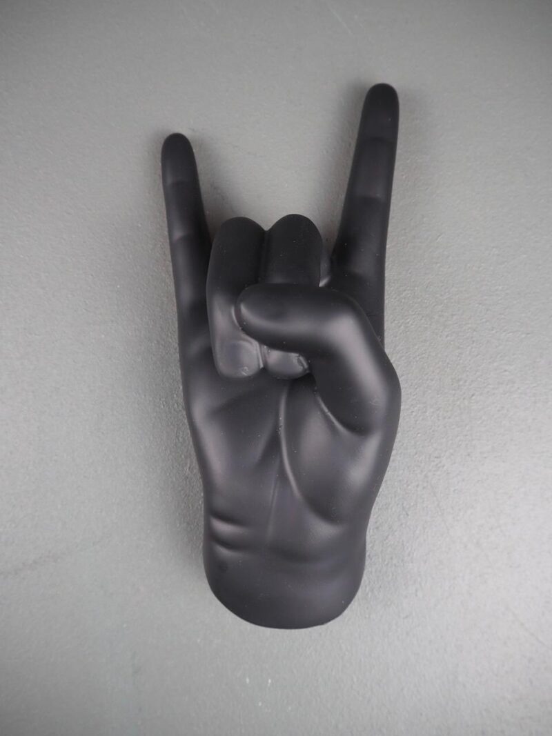 Hand on wall black