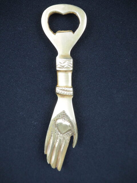 Brass hand bottle opener