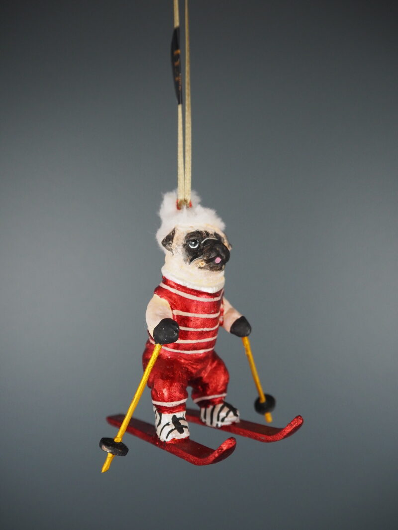 Skiing pug in red/gold  orn