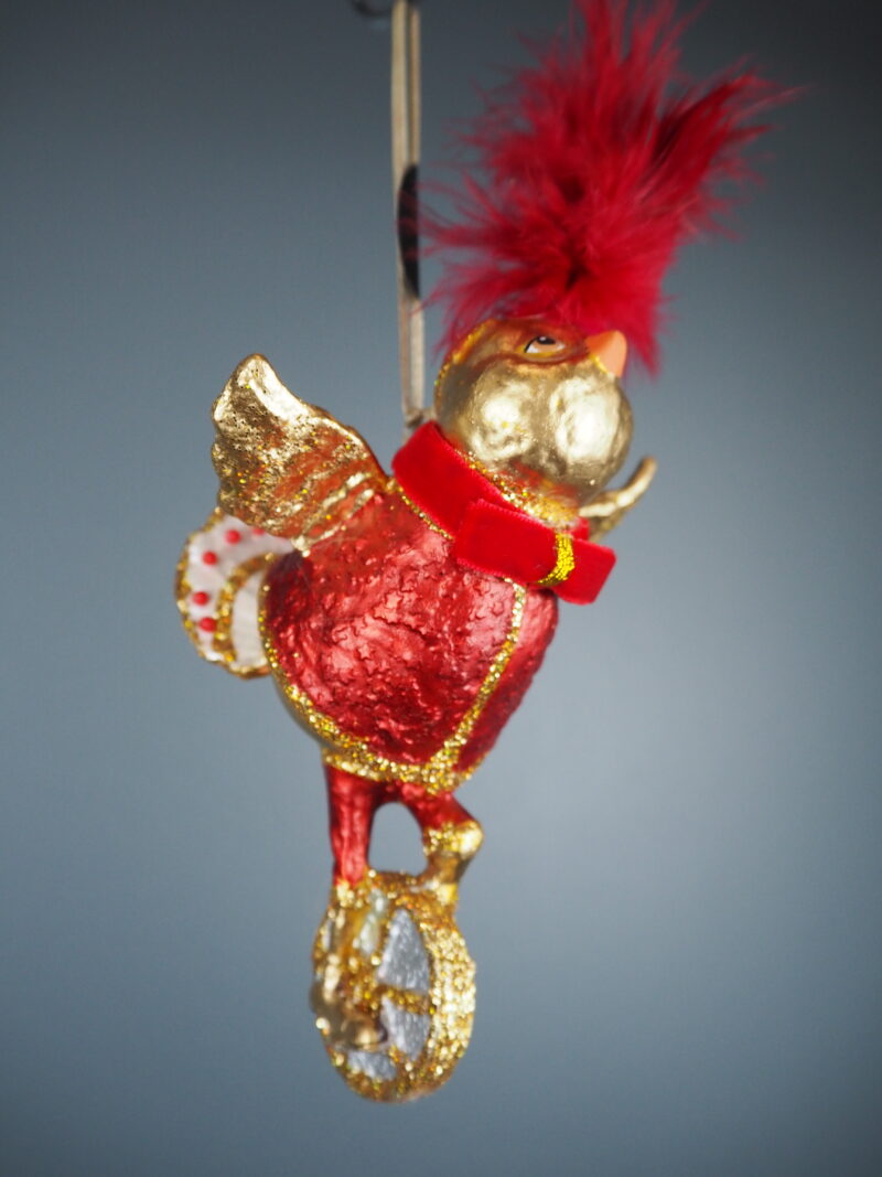 Circus chick on unicycle red orn