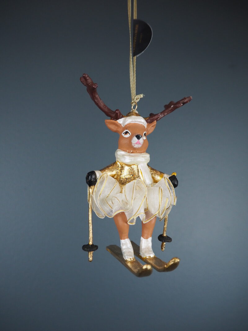 Skiing deer in white w/ fabskirt orn