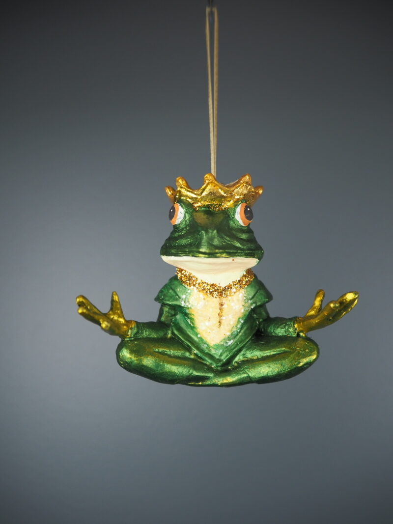 Meditating frog in green