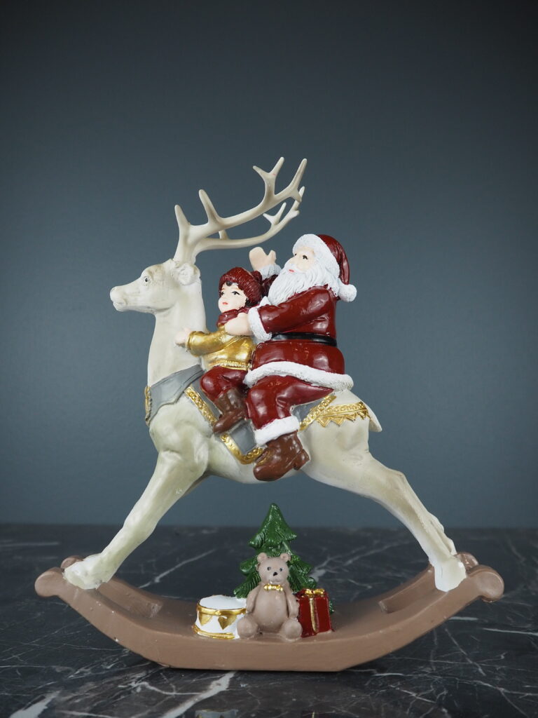 Santa riding deer