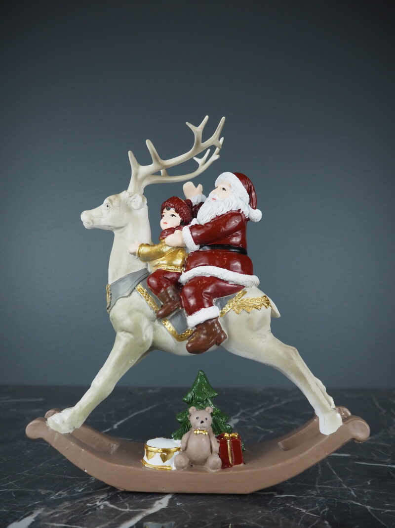 Santa riding deer